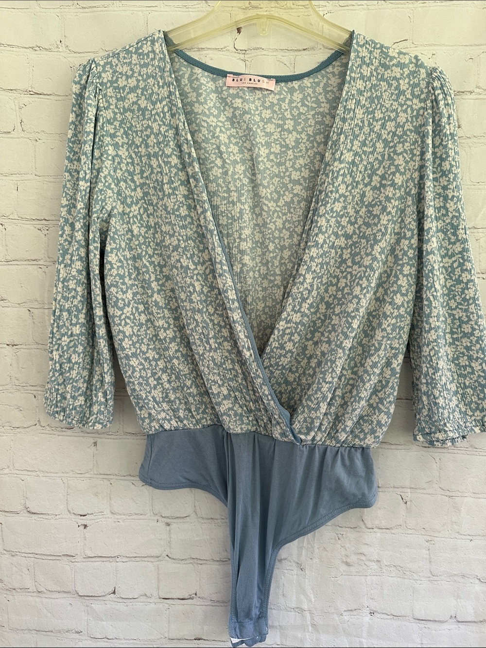 Blue Blush Light Blue Floral Wrap Bodysuit size M